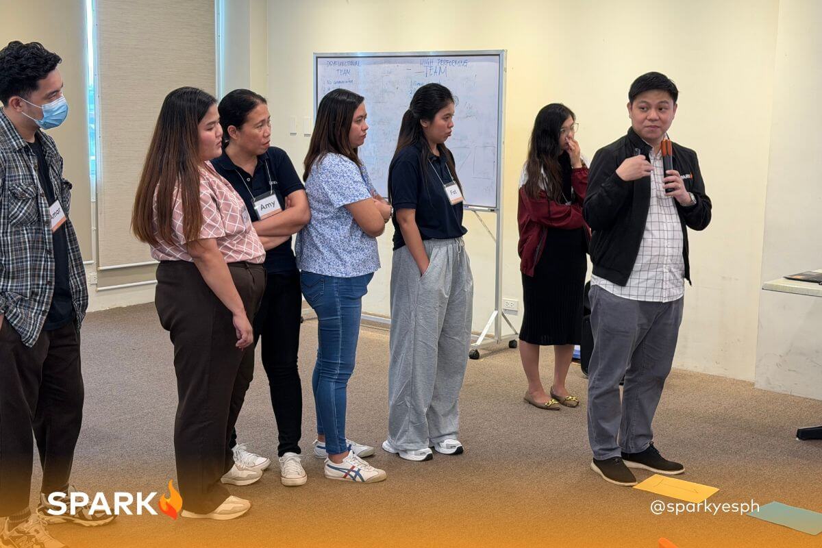 Importance of facilitator experience and qualifications in successful team building programs